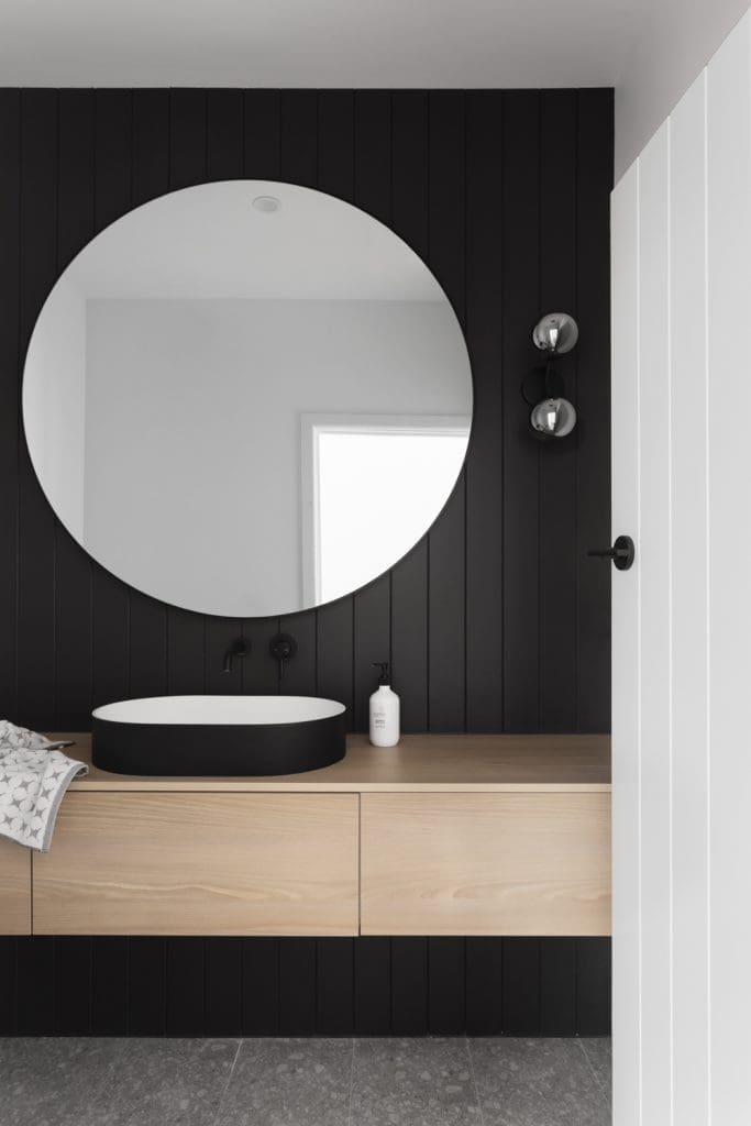 Beaumaris black joinery powder room by GIA Bathrooms & Kitchens