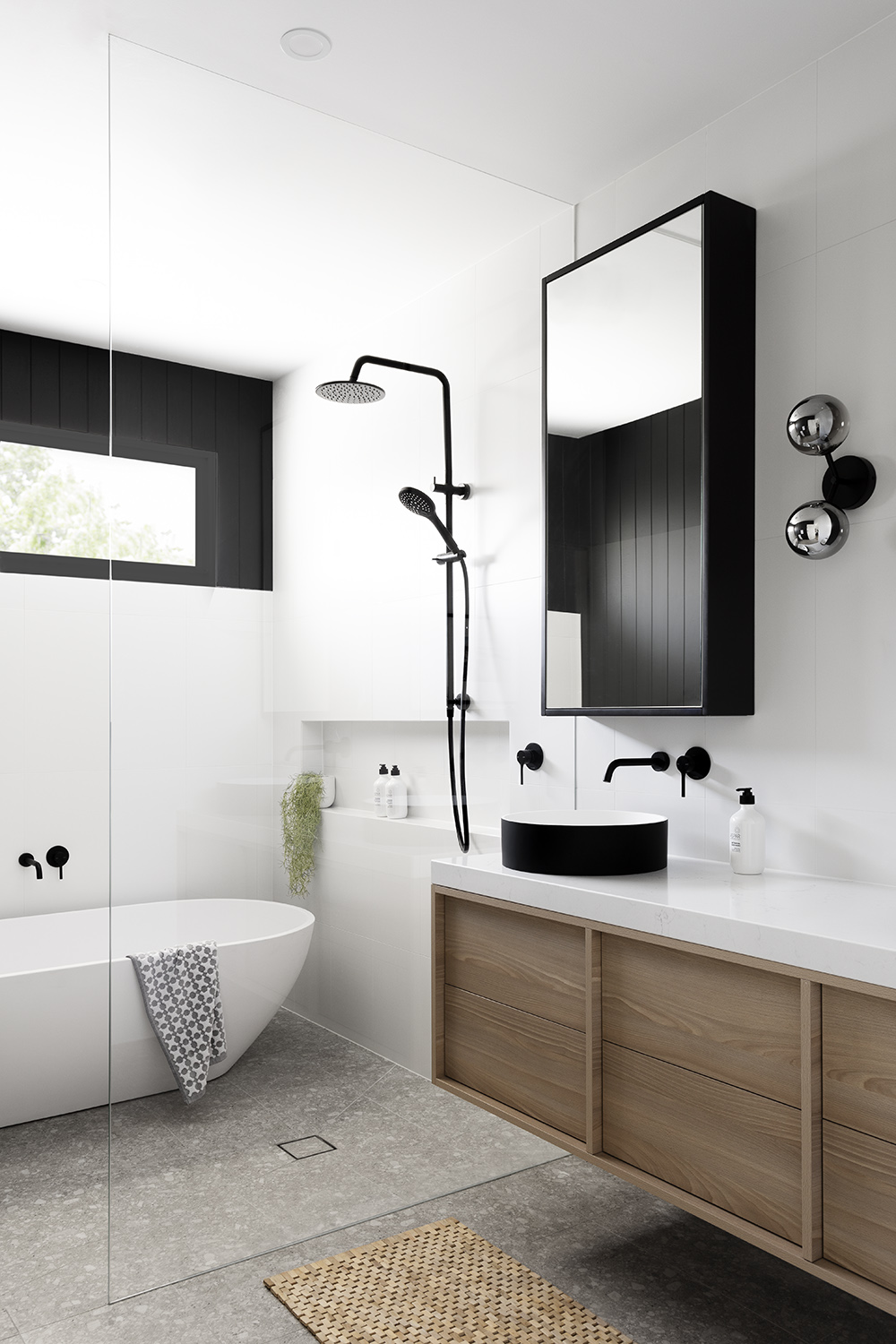 Black and white bathroom by GIA Bathrooms & Kitchens