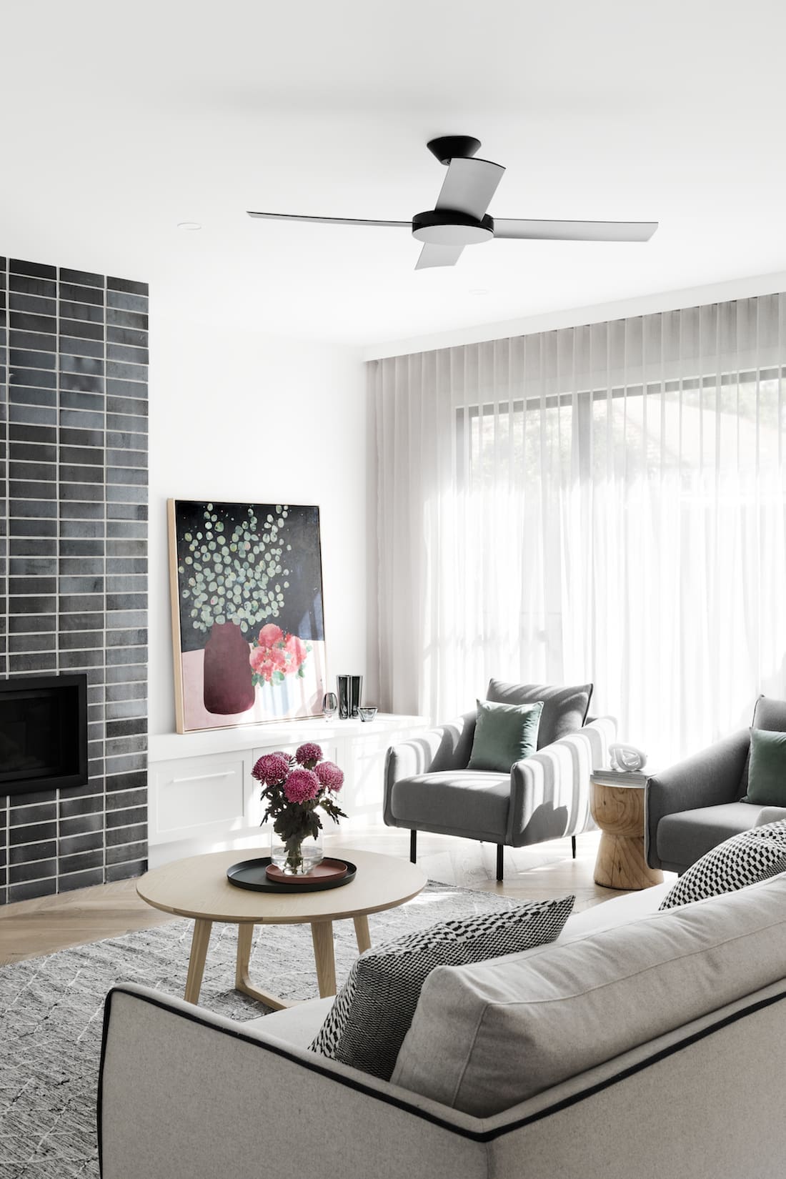 Neutral living area with tiled fireplace