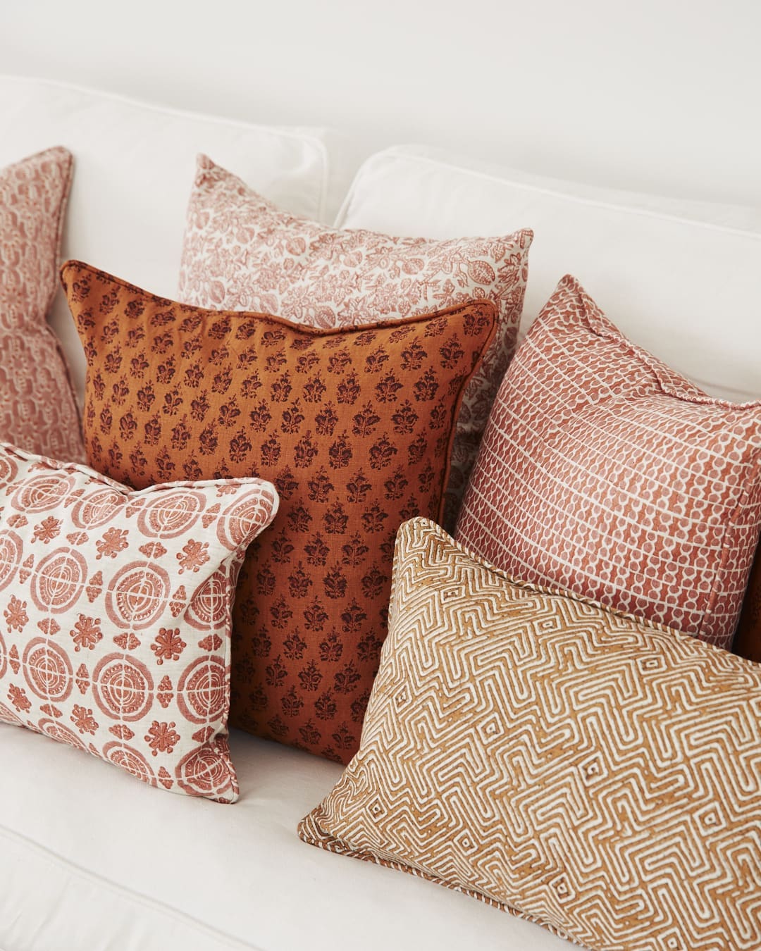 Terracotta tone hand printed cushions Walter G