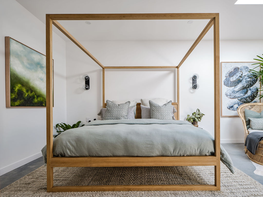 Barefoot Escapes wooden and green neutral bedroom