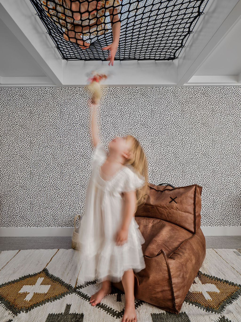 Childrens play net in dalmatian print bedroom