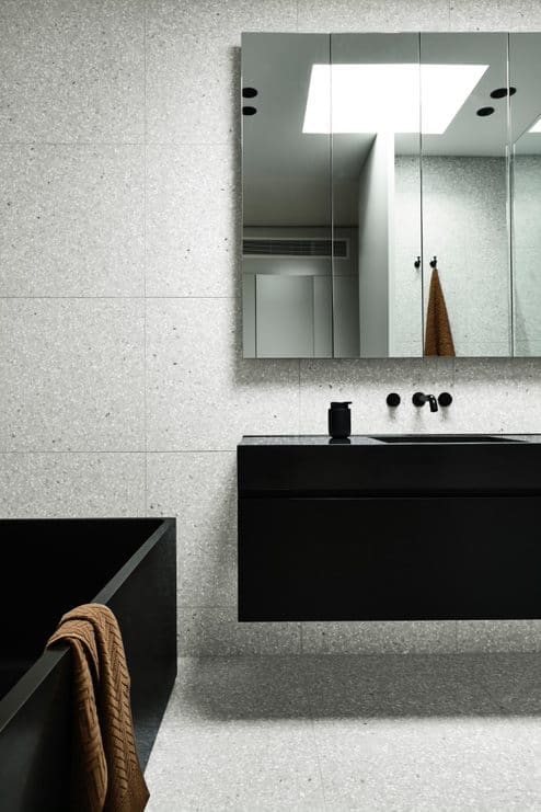 Grey and black bathroom with sharp edge bath