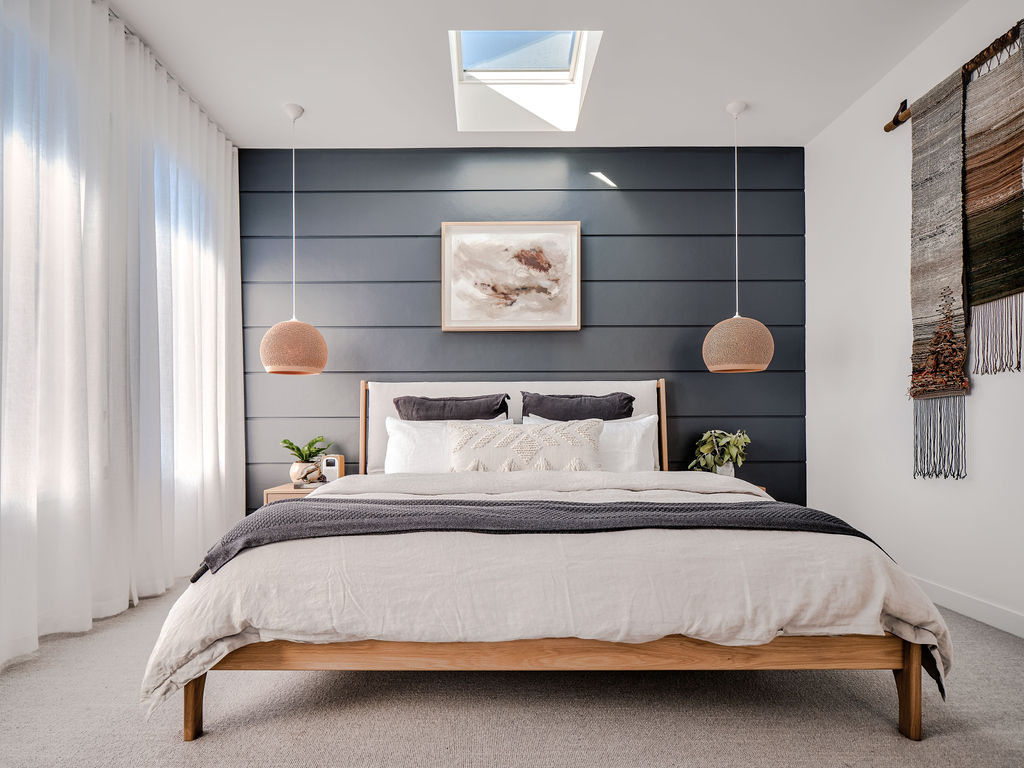 Grey and white bedroom with skylight Barefoot Byron Villa