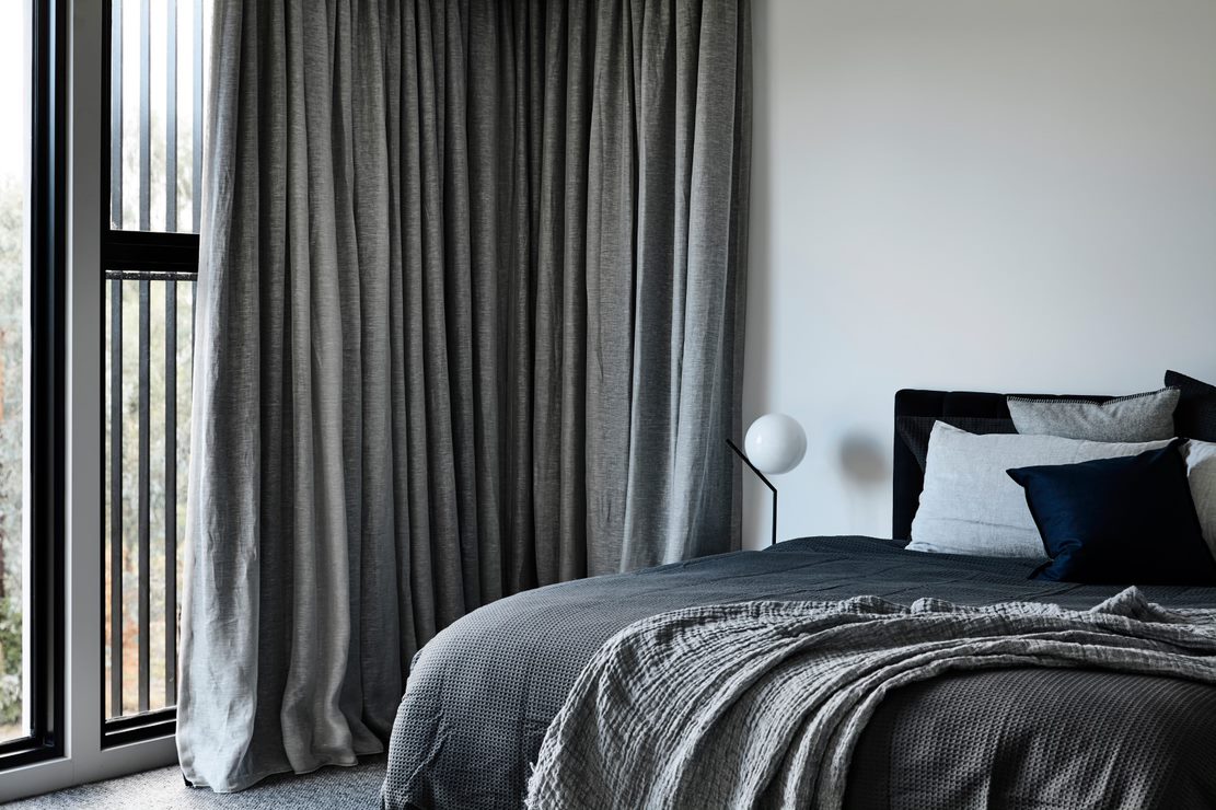 Grey bedroom in Biasol home