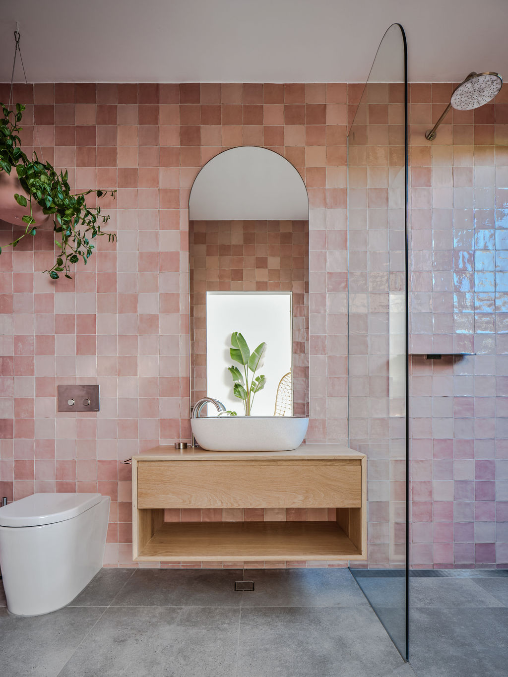 Pink tiled bathroom in Byron Villa bathrooms that don't use white tiles