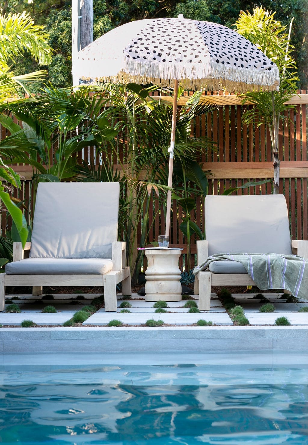 Pool area with leopard print umbrella