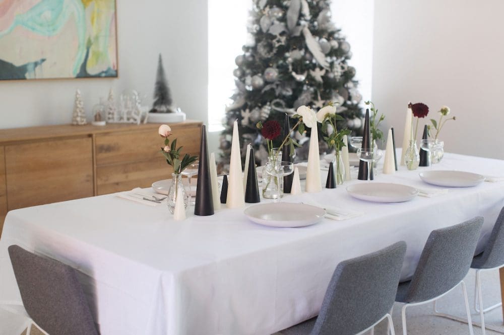 Black and white candle and floral table setting