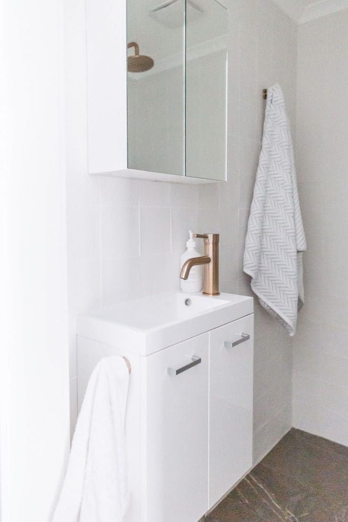 Mirrored cabinet in smallest bathroom