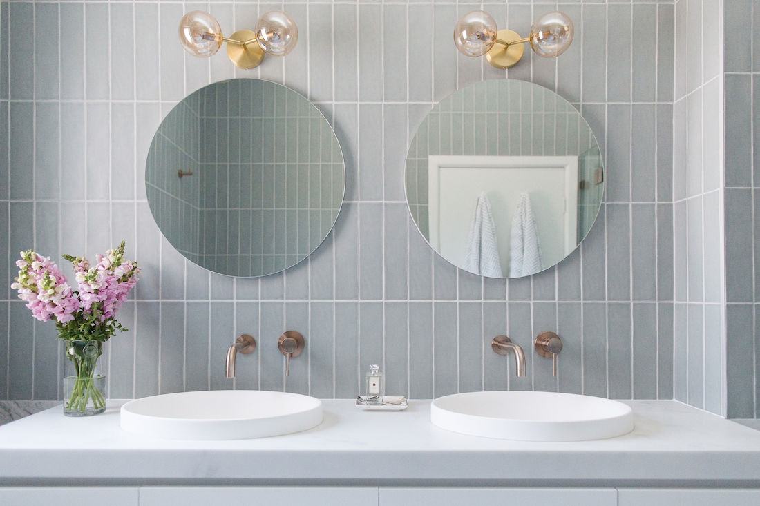 Erskineville main bathroom_round mirrors, sinks, bold lighting
