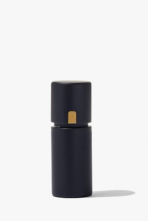 Black and brass grinder