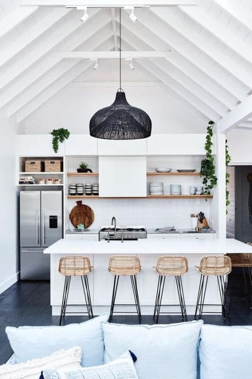 Coastal kitchen with boho chic open style shelves