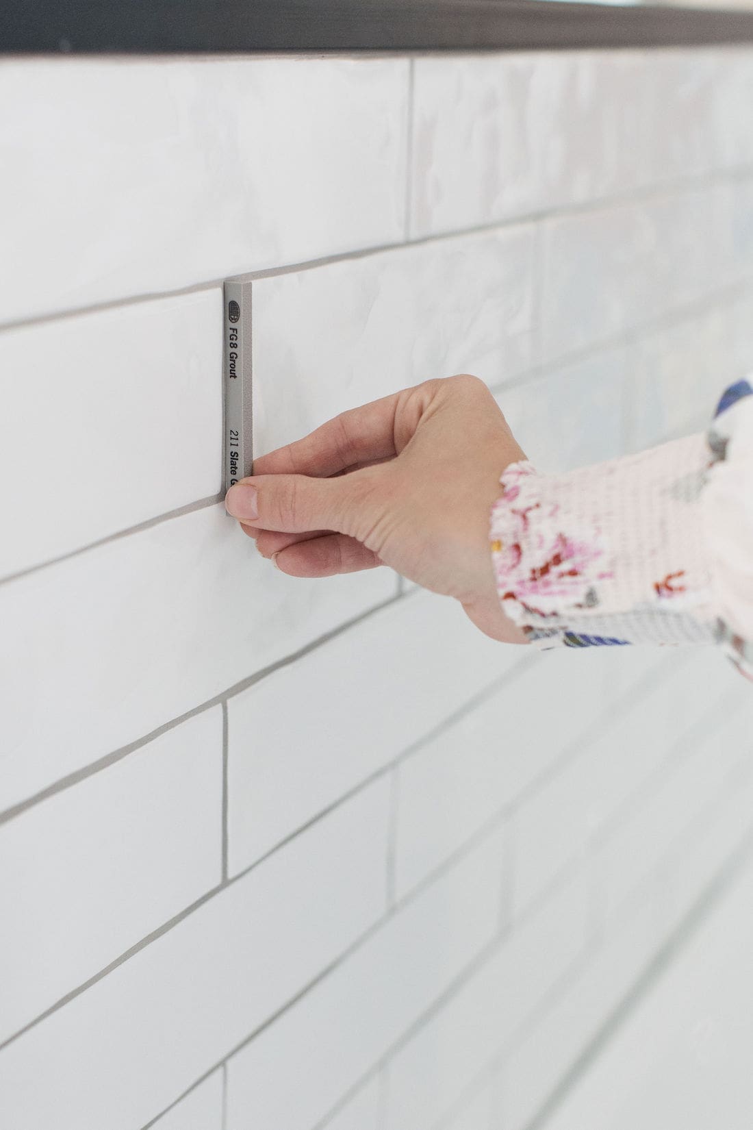 White tile with dark grout picking the right grout