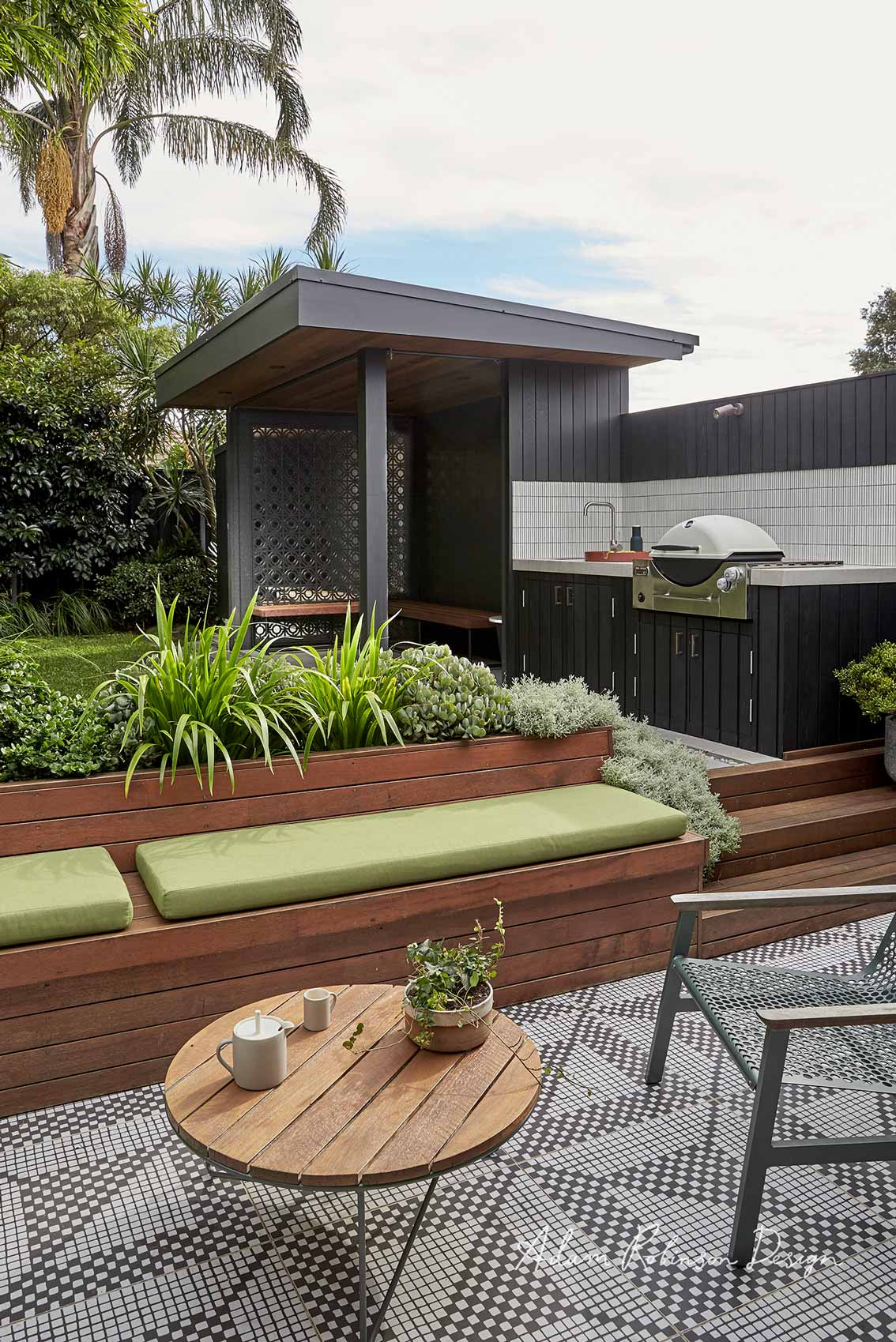 Sunken outdoor lounge with BBQ area