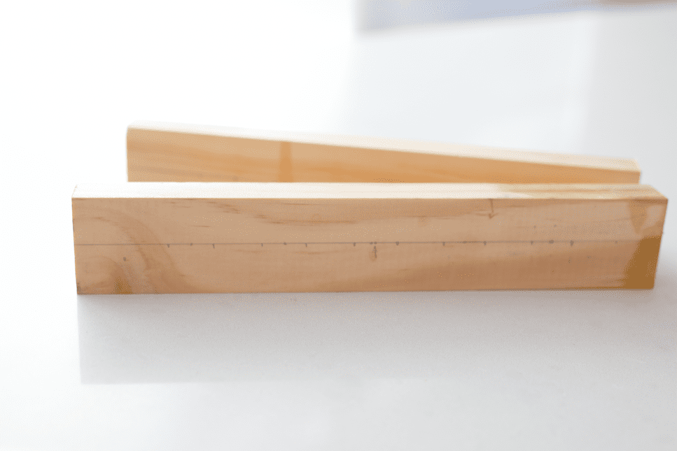 Mark on timber where test tubes should be