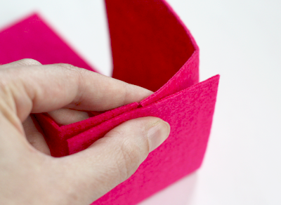 Folding the sides of a DIY felt box