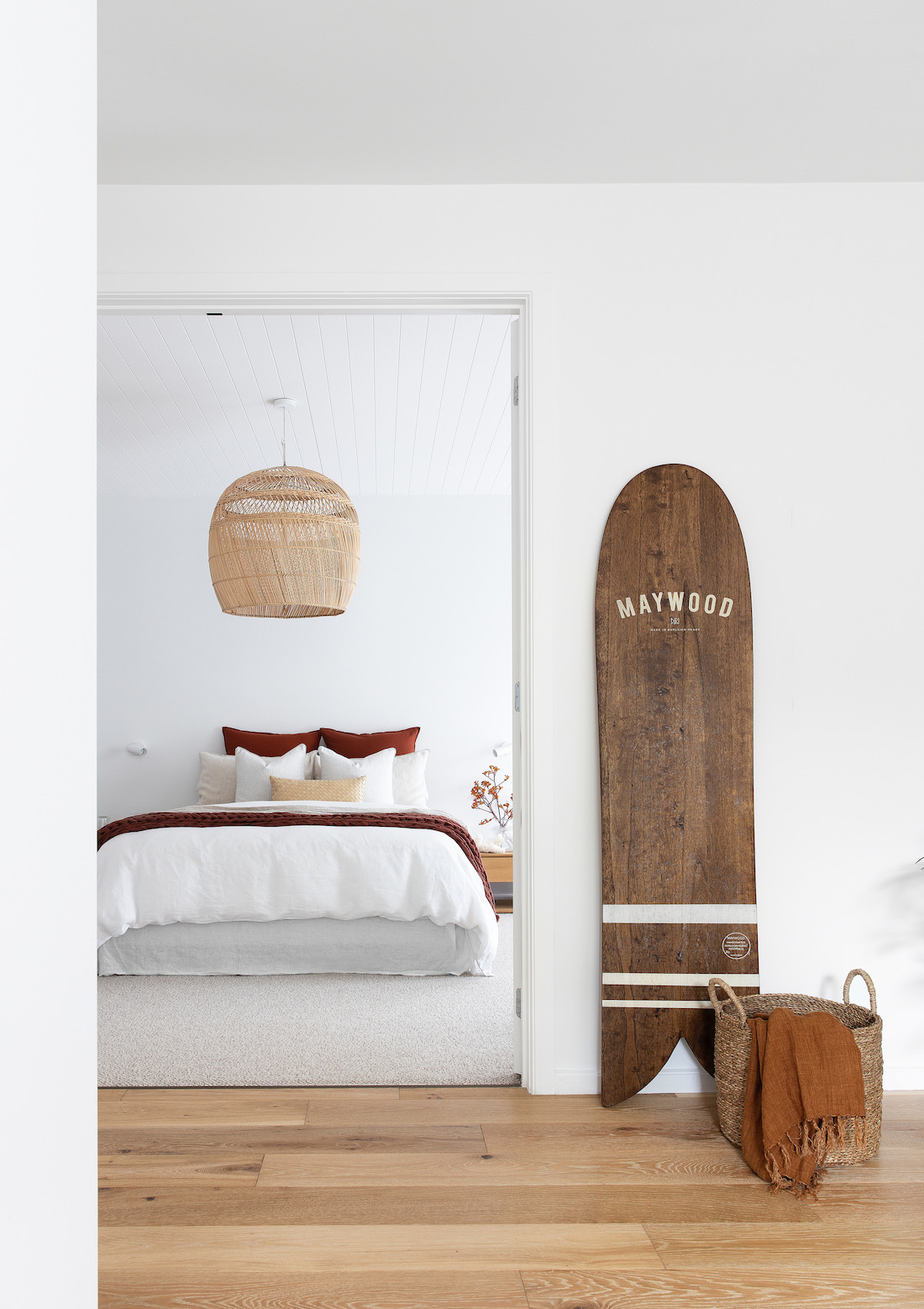 Bedroom with wooden surfboard