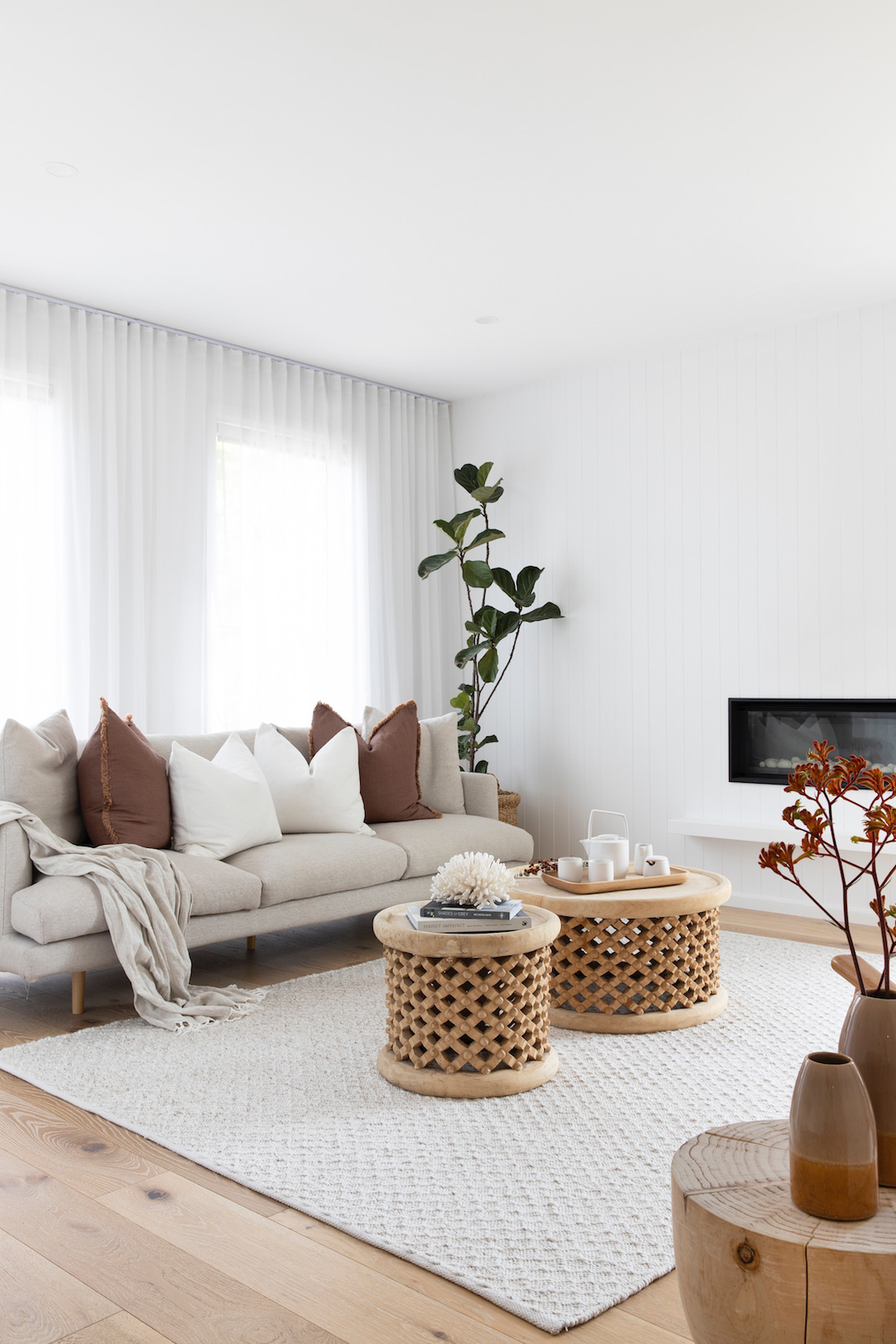 White living room with rust accents