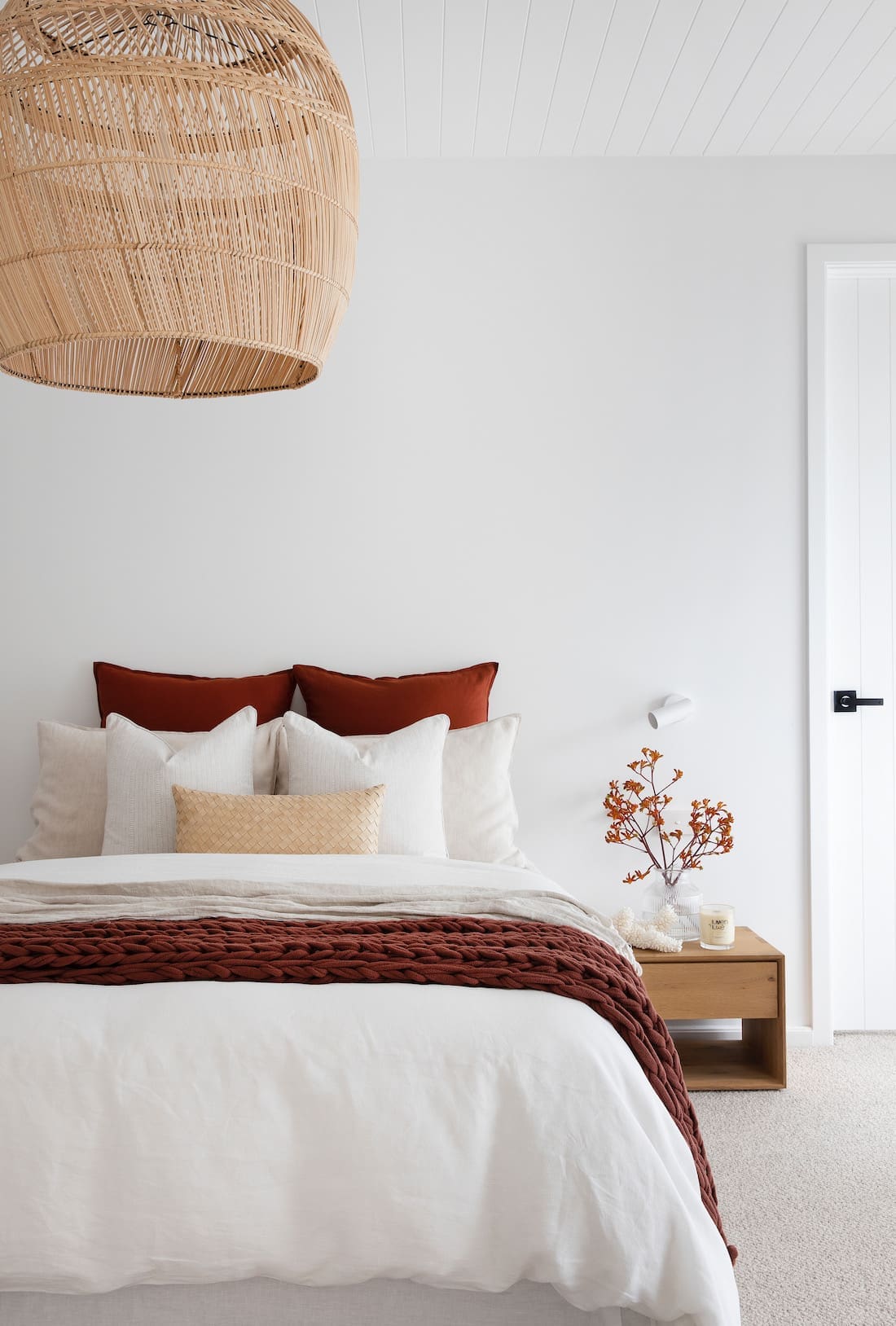 Main bedroom with rust accents