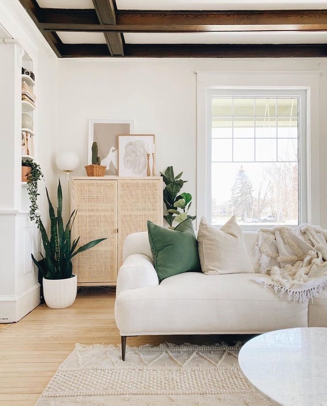 indoor plant styling in boho living room