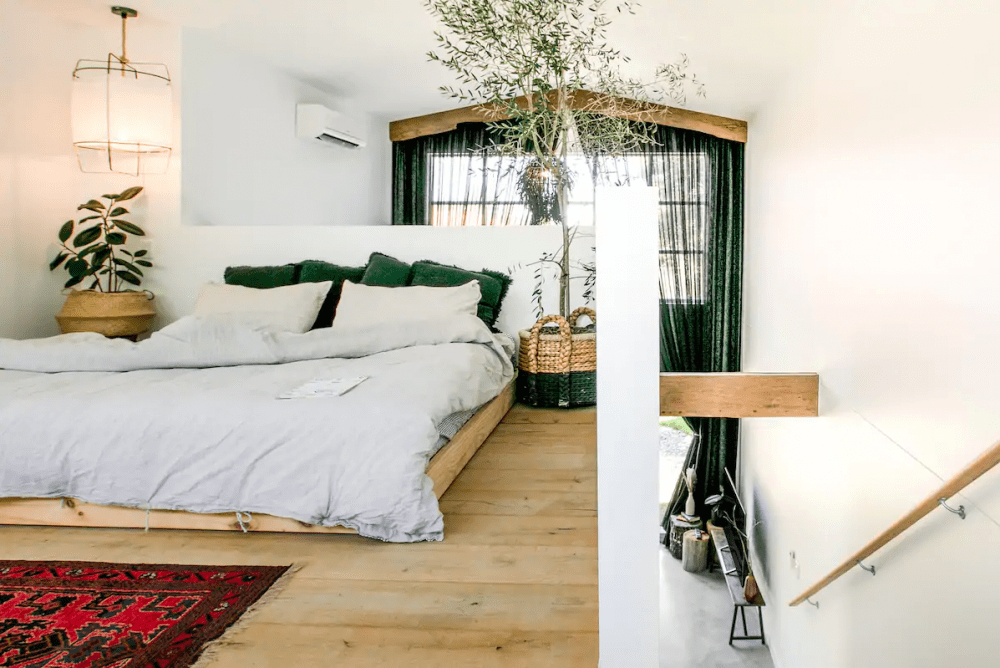 The Pool House_loft bedroom with stairs one of Queensland's best Airbnbs