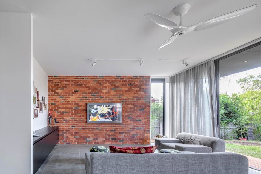 ab House_Ben Walker_living room red brick wall