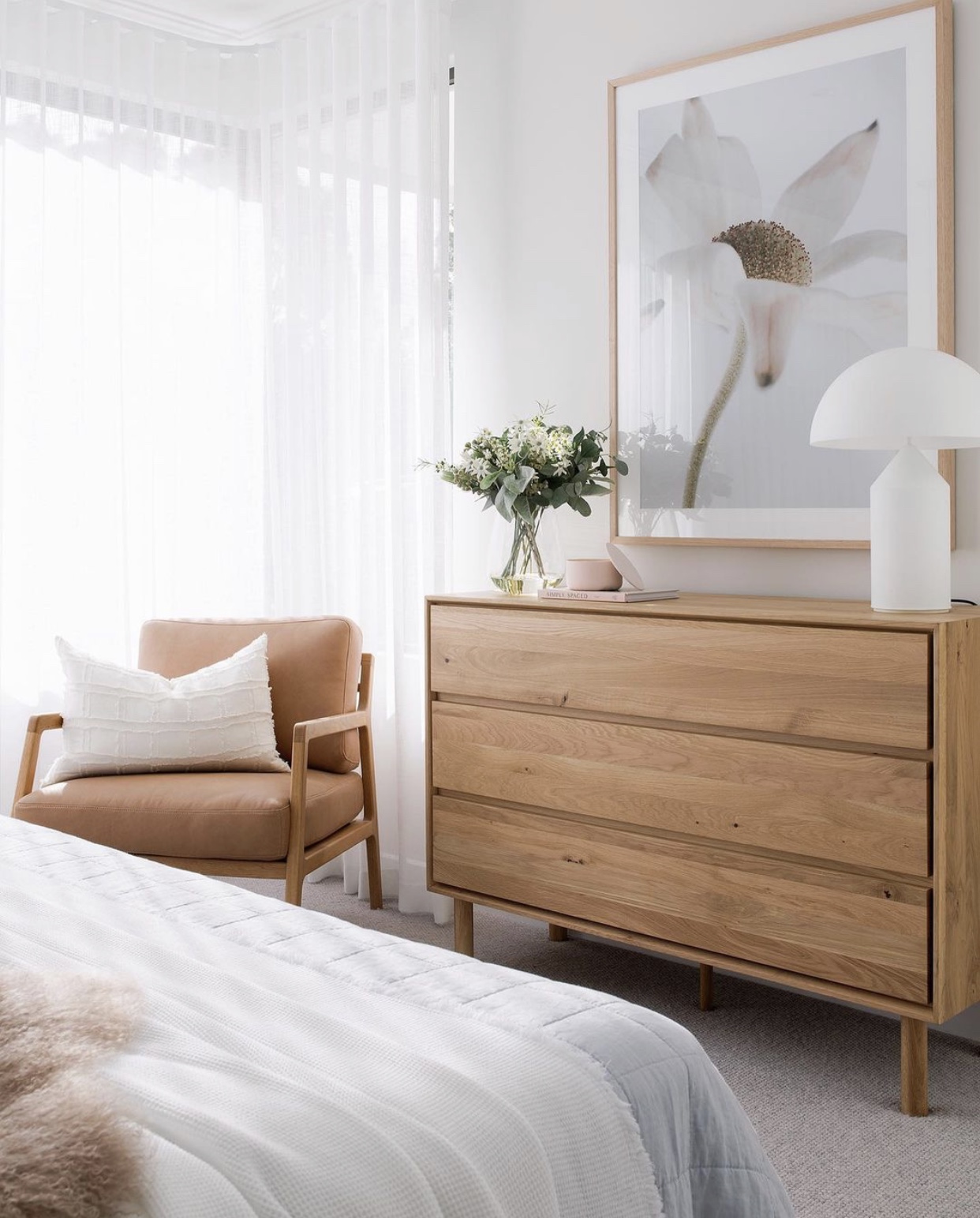 Bedroom with outlet dresser