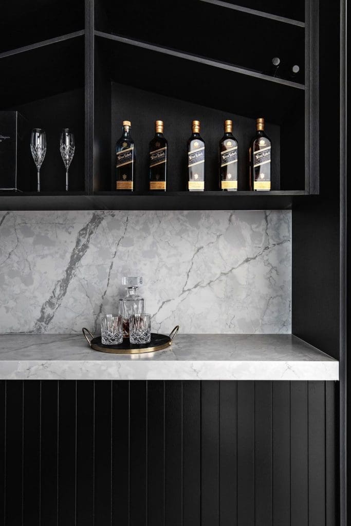 Cellar in black kitchen