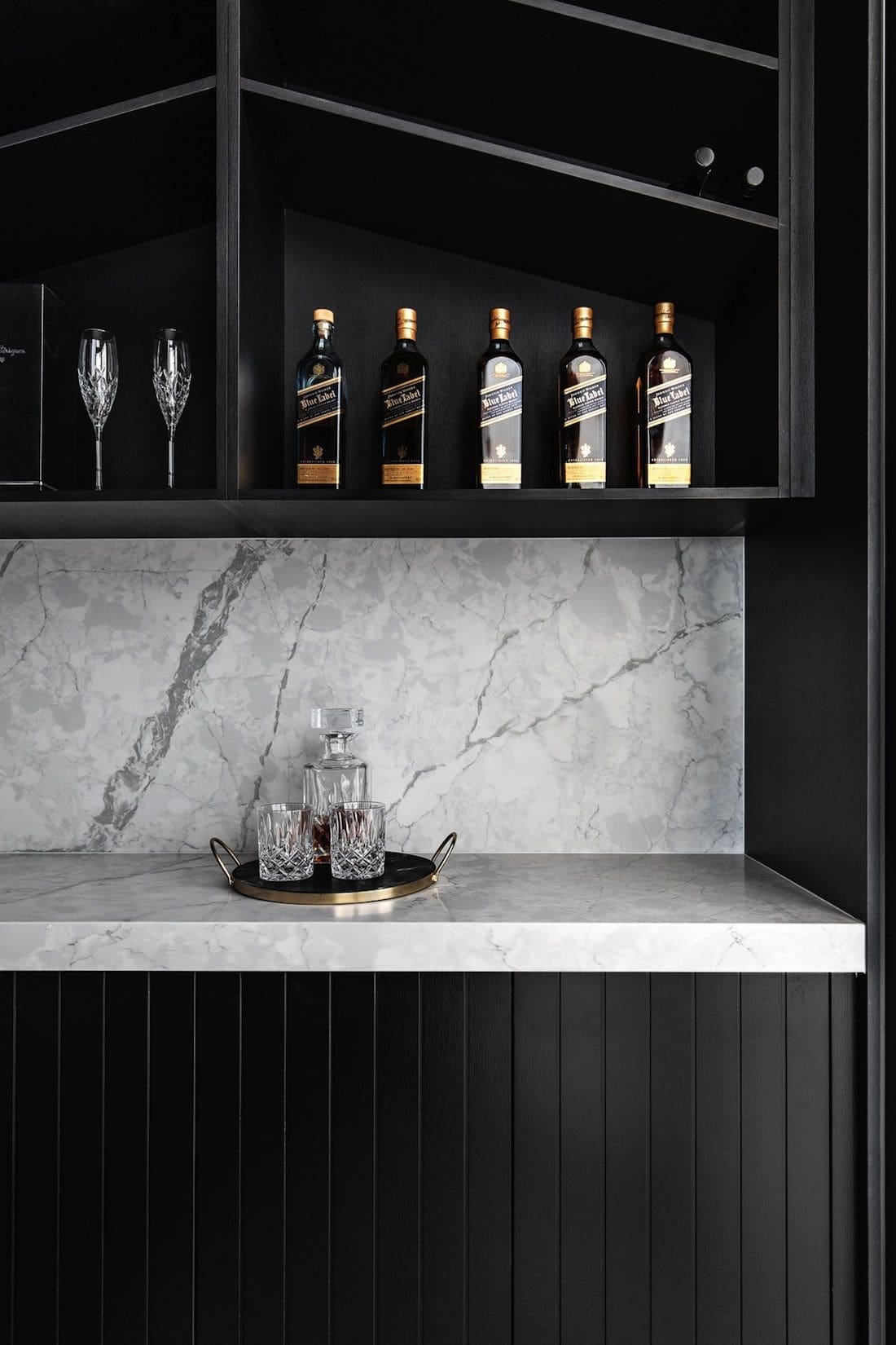 Cellar in black kitchen