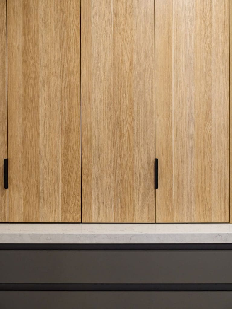 Timber cabinets with black handles