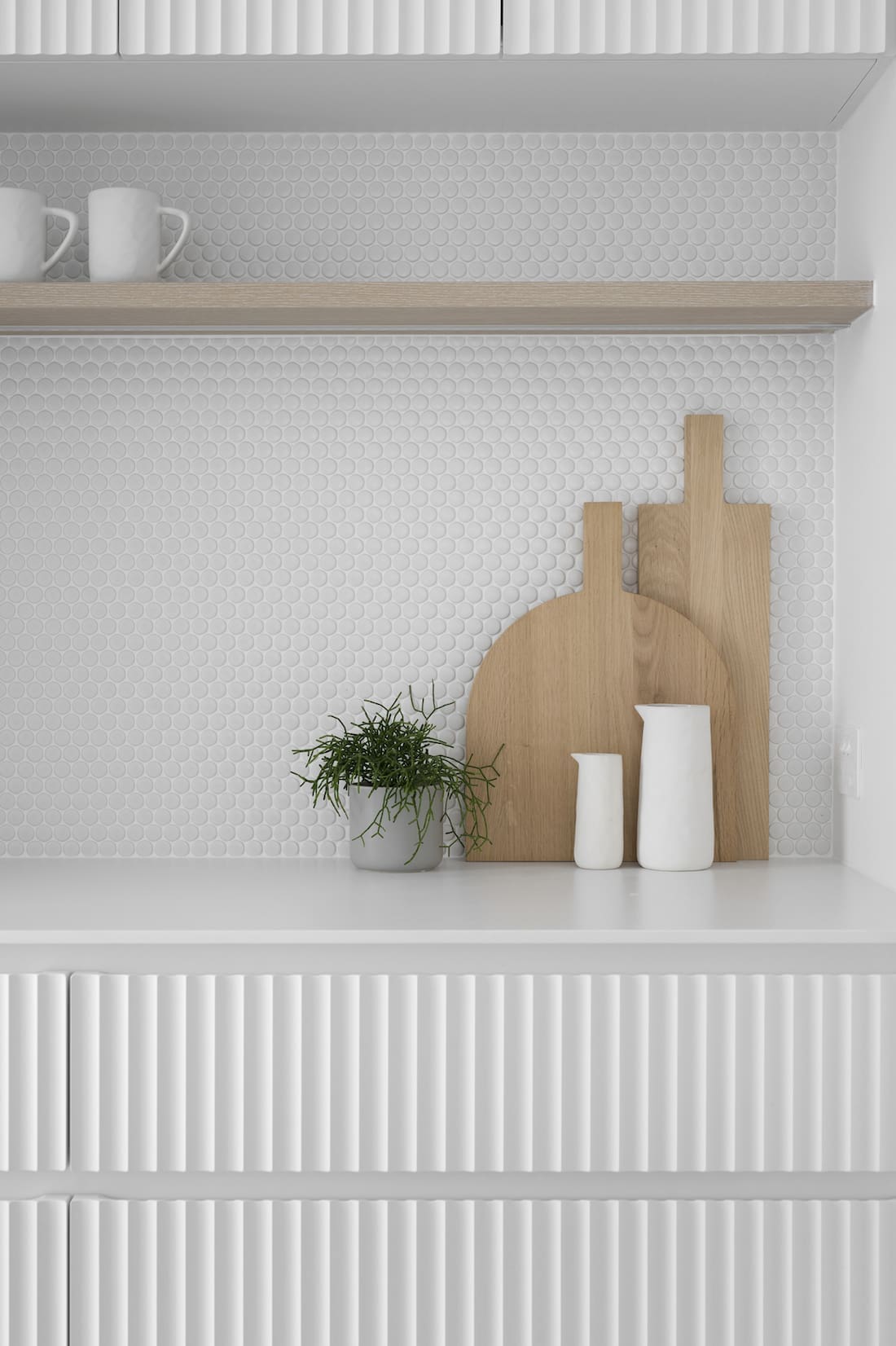 Wooden chopping board vignette in pantry