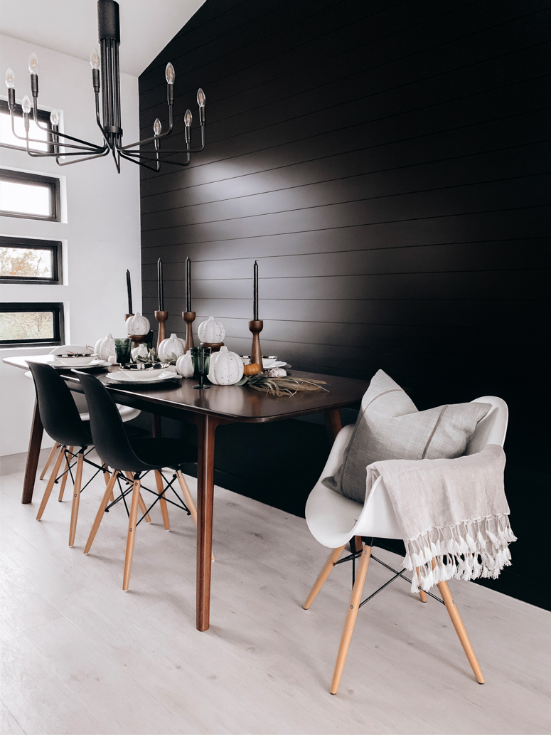 Black feature wall in Scandi dining room