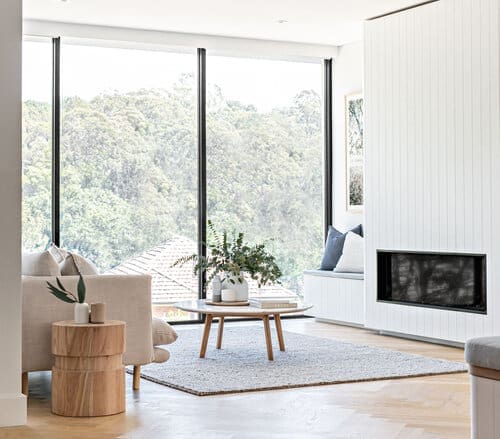 Living room with floor to ceiling windows