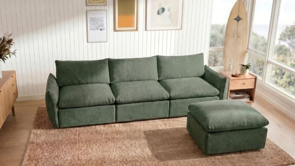 Bruny Modular Sofa Bed 2 Seater with Single Ottoman in Evergreen, featuring deep cushions, a modular design and a matching ottoman in a contemporary living room.