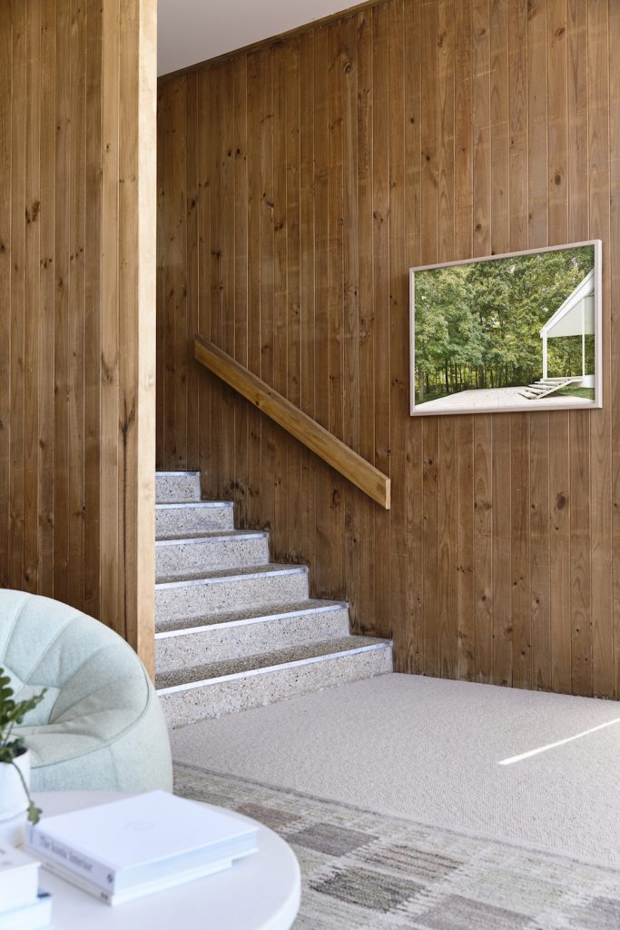 Timber panelled walls and pebble crete stairs