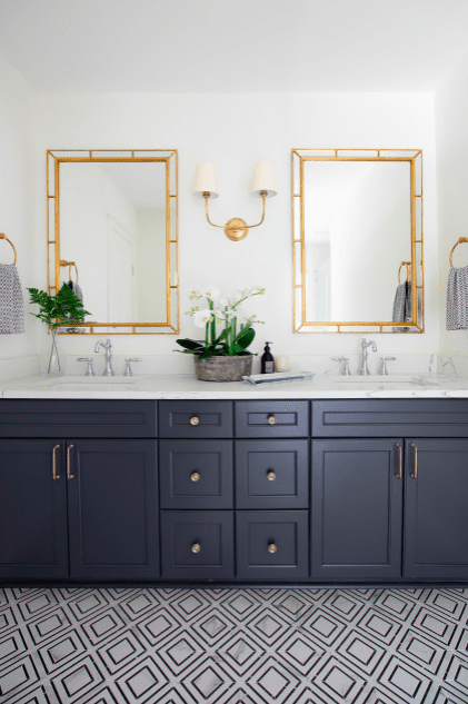 Patterned tiles in traditional Victorian style bathroom