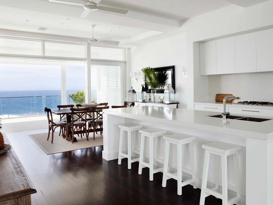 Coastal Hamptons home kitchen and dining space