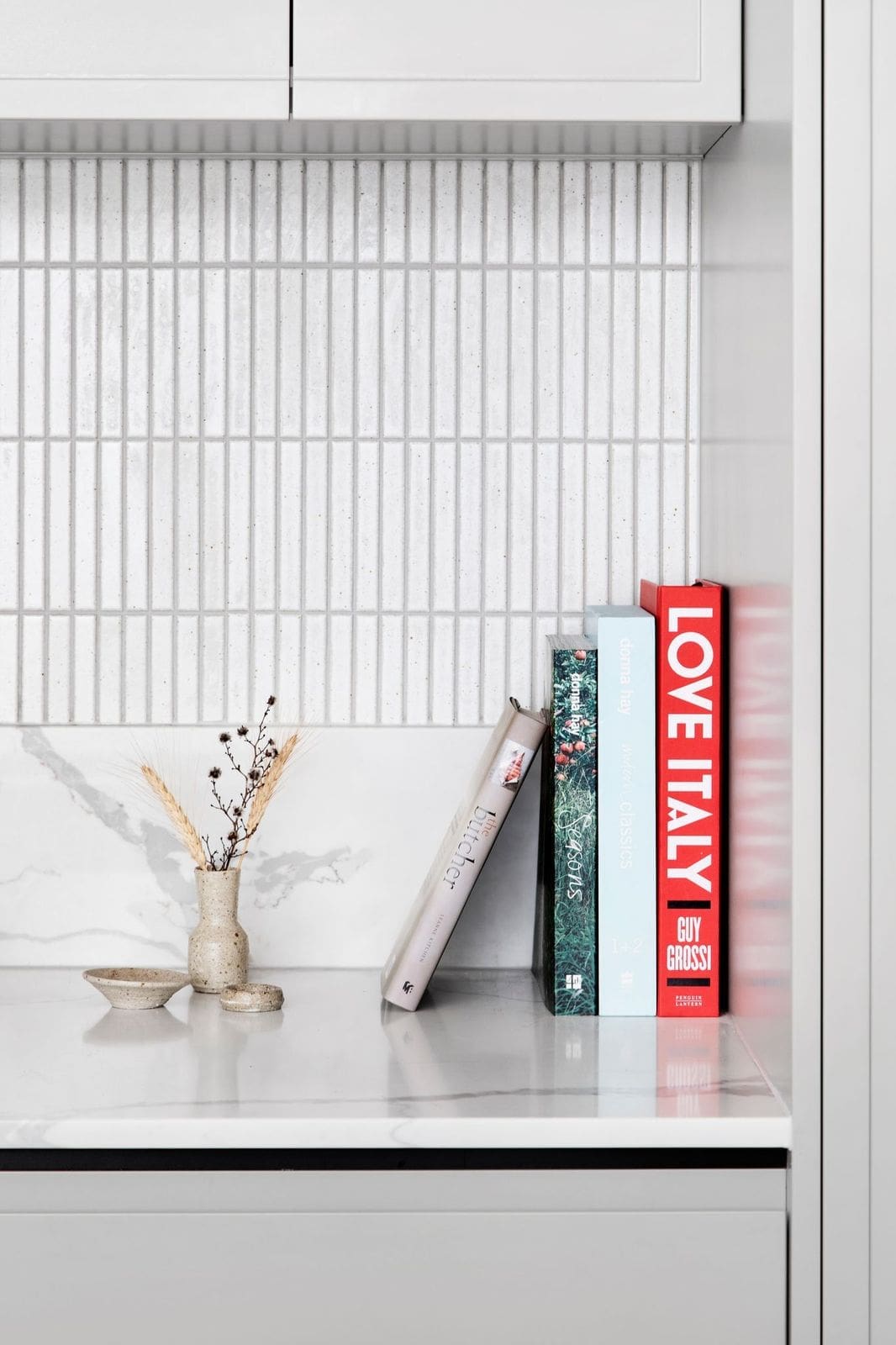 Cook books in kitchen nook