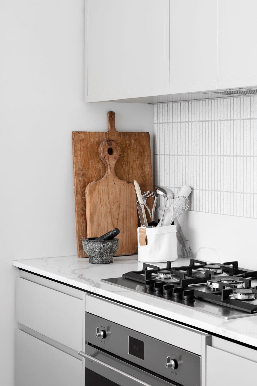 Wooden chopping board vignette in kitchen