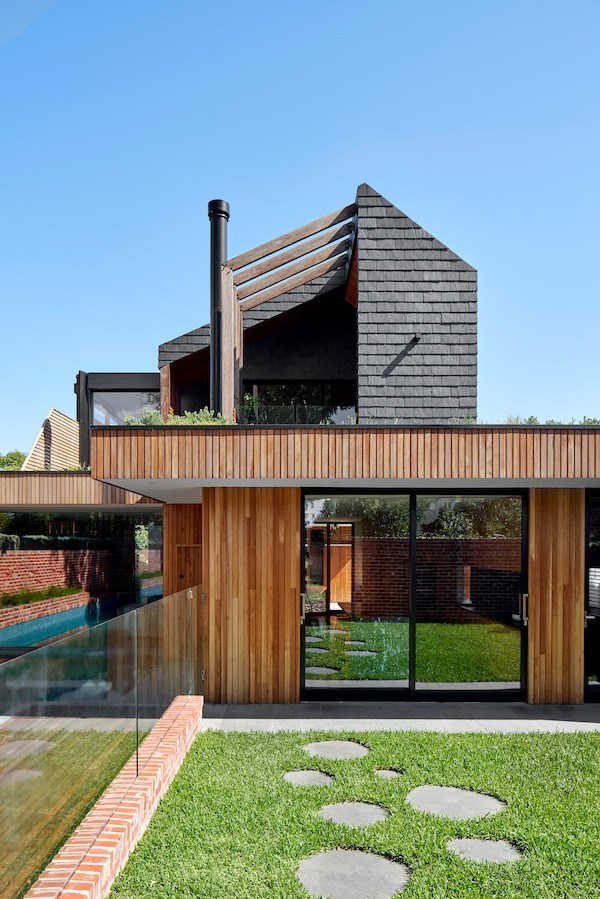 Exterior of Maxwell residence with slate and timber materials