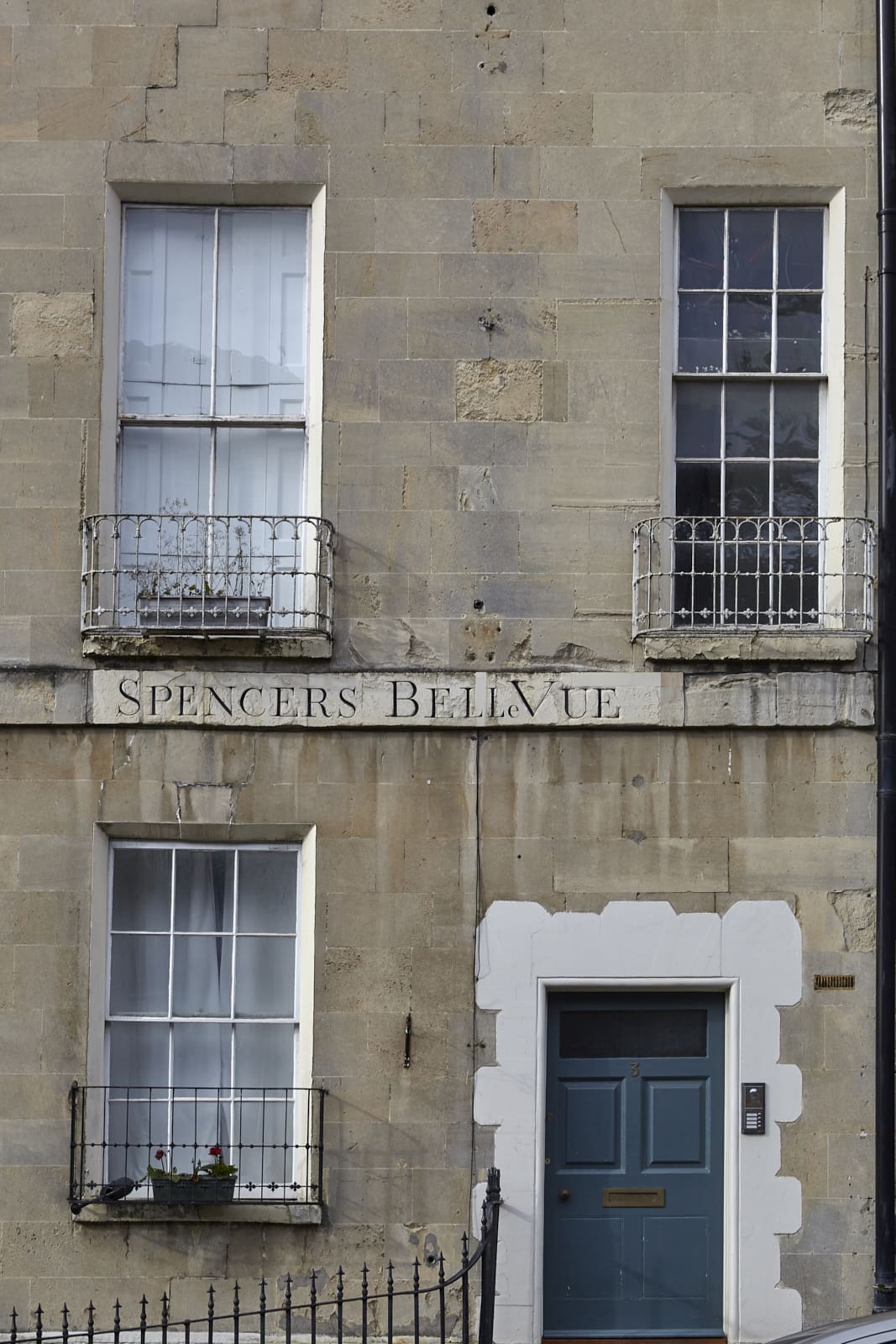 Belle Vue Georgian apartment exterior with ornate balconies