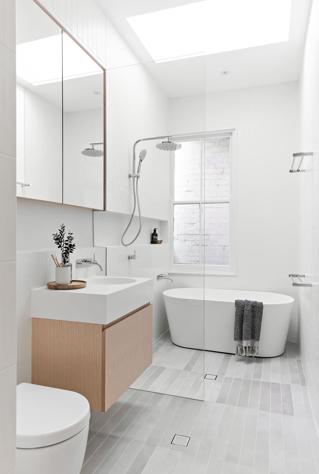 White bathroom with timber accents