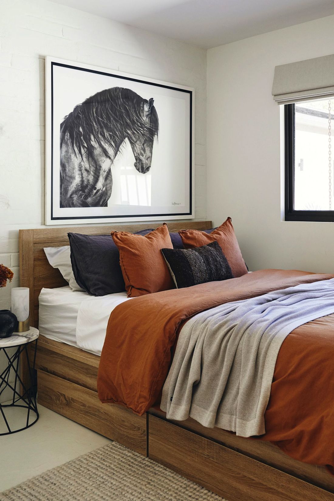 Terracotta bedding and horse artwork