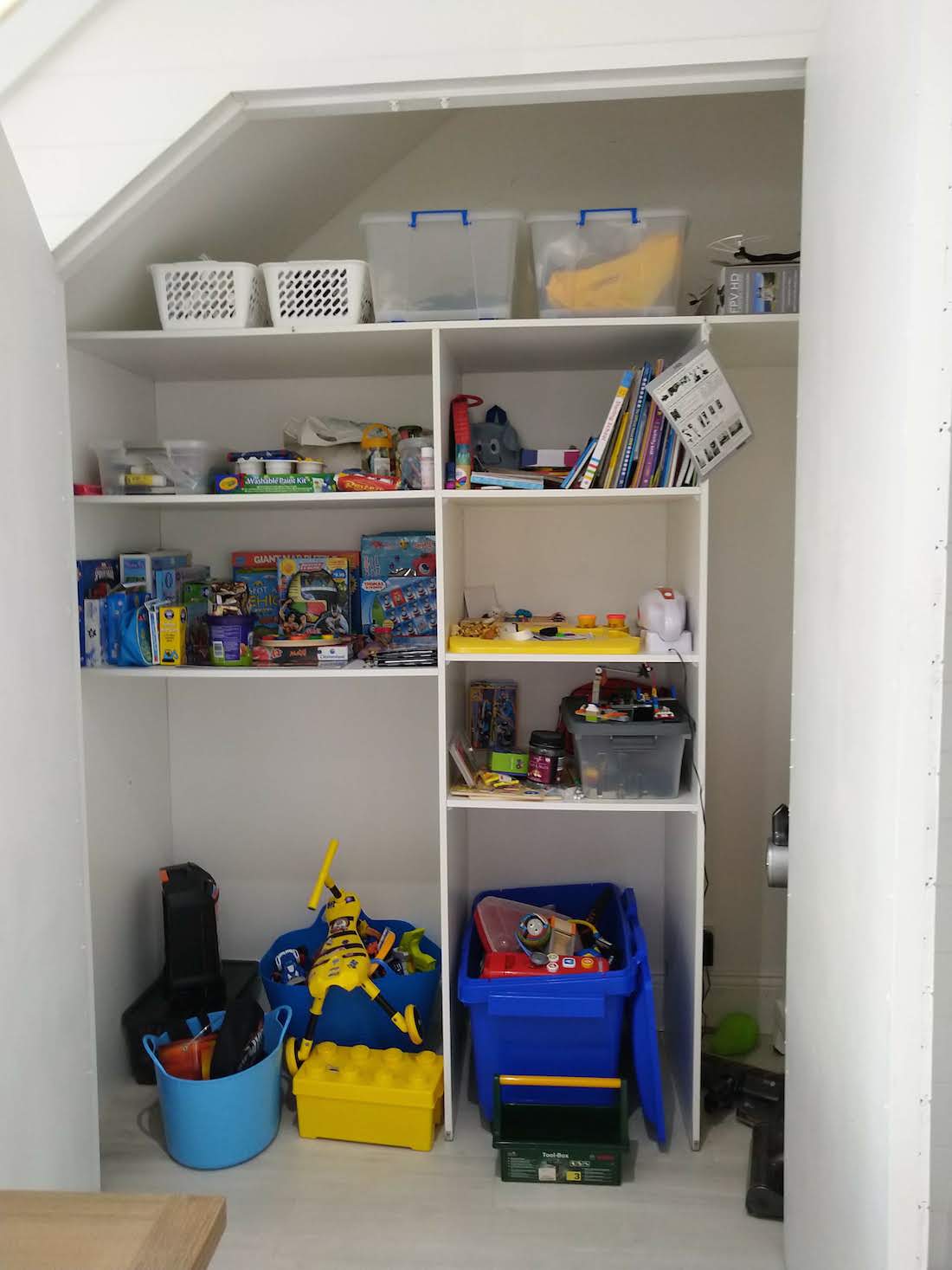 Under-stair toy storage