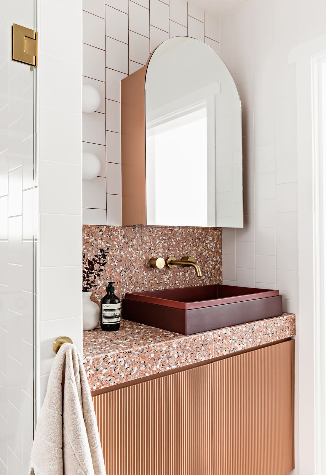 Burgundy sink in terrazzo bathroom with Fibonacci Stone terrazzo Fatima's Reflection