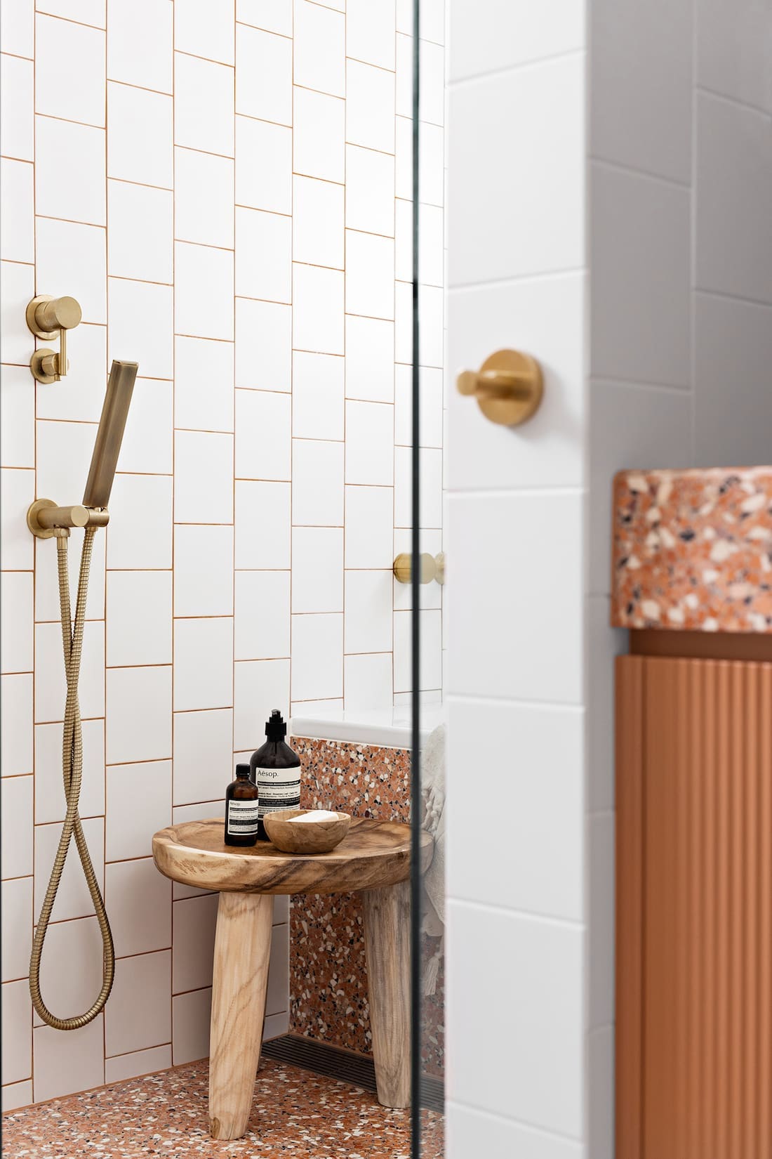 White and red bathroom with Fibonacci Stone terrazzo Fatima's Reflection