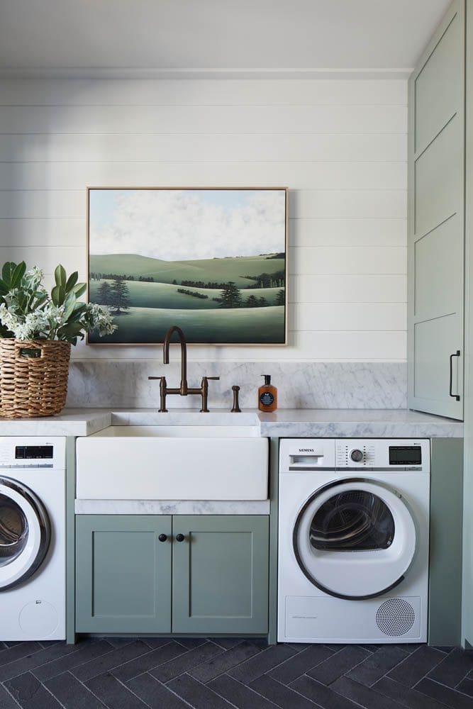 Modern country sage green and marble laundry