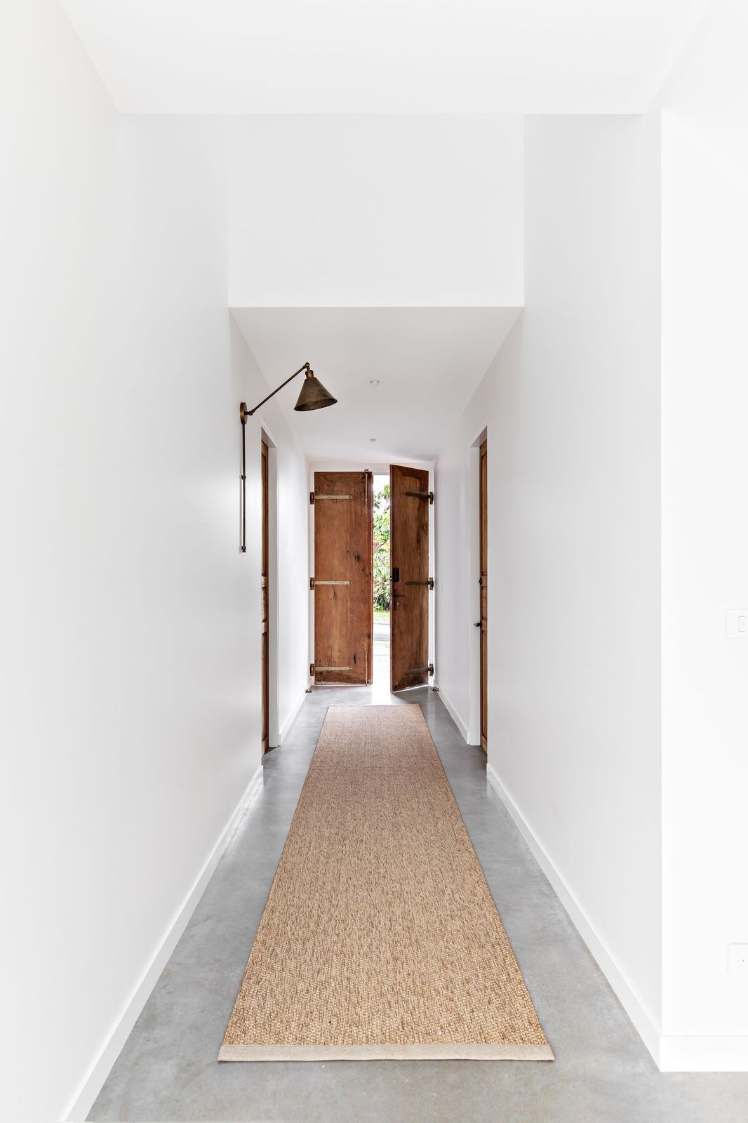 Hallway with teak finishes