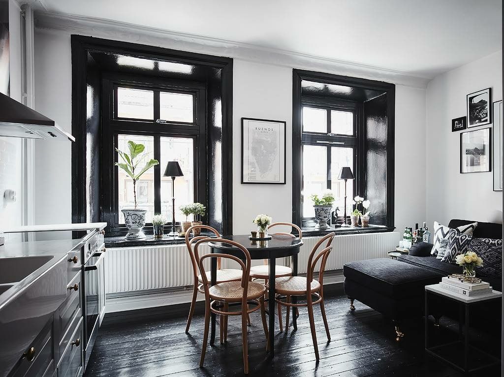 Black polished floors in dining space