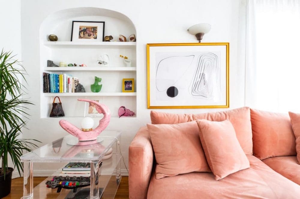 Recessed bookshelf in wall with arch top